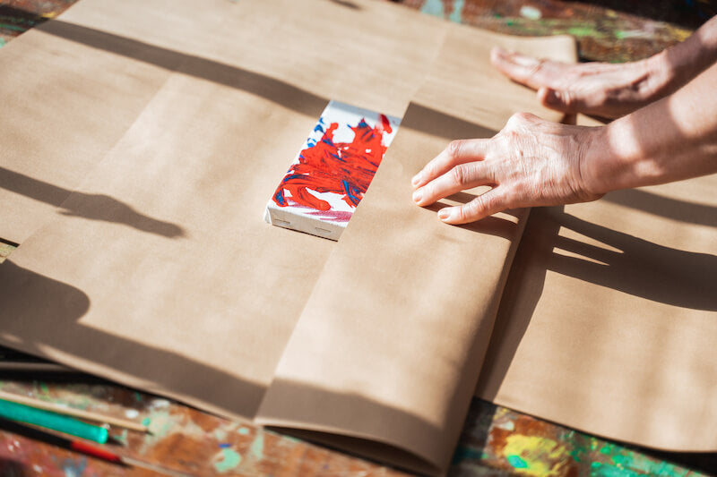 Artist preparing art orders for fulfillment
