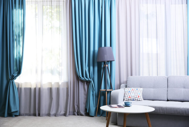 6 Tips For Choosing Curtains For Your Living Room: Fabric, Length & Color